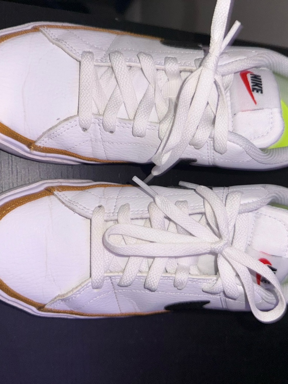 Nike White Leather Trainers with Black Swoosh and Tan Trim